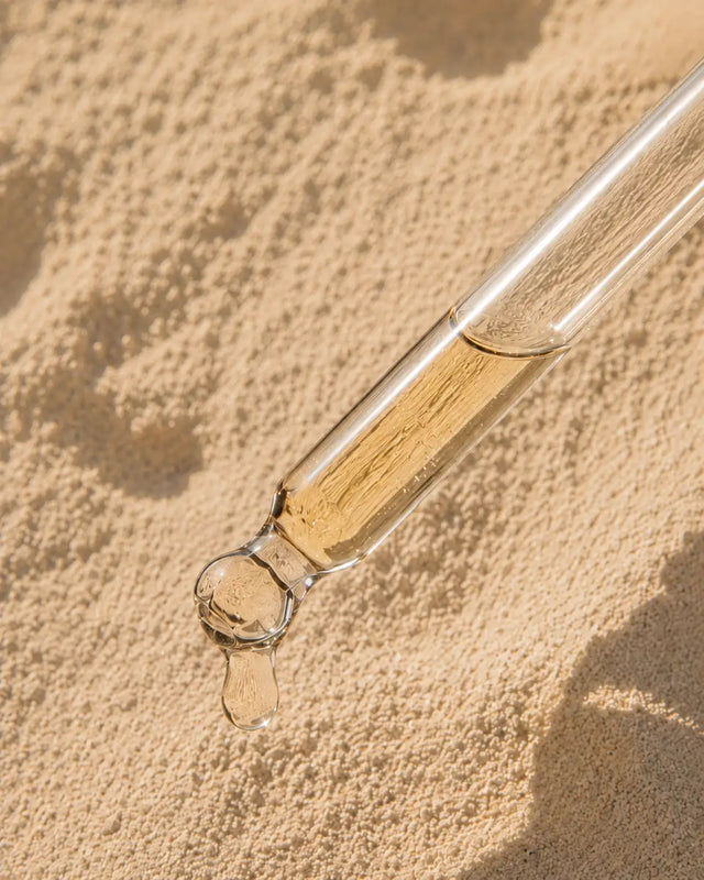 Dropper applying Olive & Foam Diffuser Oil to a diffuser