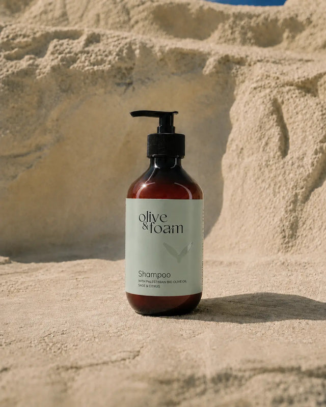 Olive & Foam Shampoo Sage & Citrus lifestyle shot — Palestinian olive oil hair care UAE