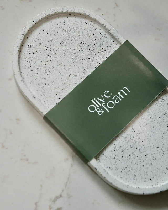 Olive & Foam soap tray styled with hand wash bottle in bathroom setting